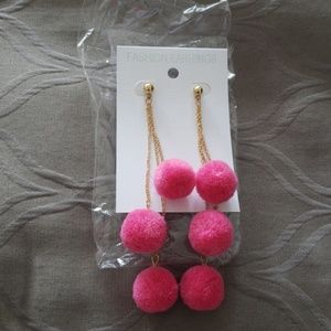 Pom pom earrings never worn